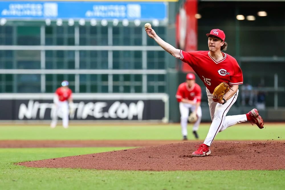 Nathan Hall pitching for the Mules